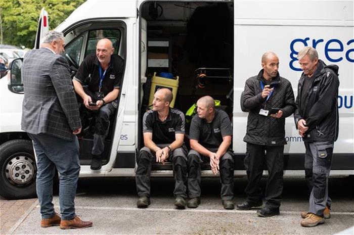 Colleagues and a van