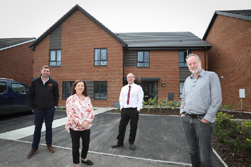 The first resident at Ordsall Scheme with Deputy Mayor of Salford