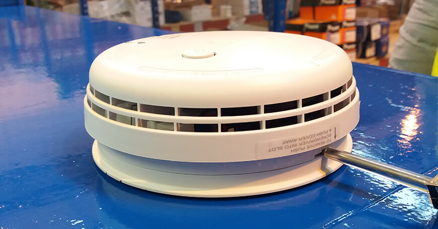 Image showing smoke alarm cover being replaced