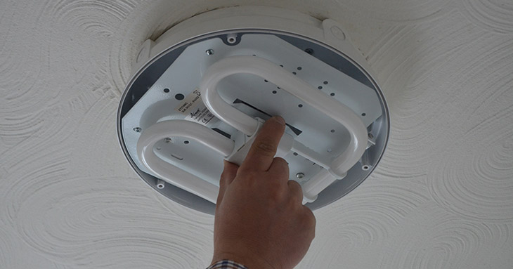 Image showing lamp being removed from the light fittings