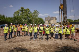 Contractors and visitors on site at Russell Road