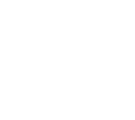 Hand holding a stack of coins with a small plant sprouting from the top